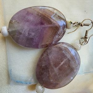 Earrings are purple fluoride